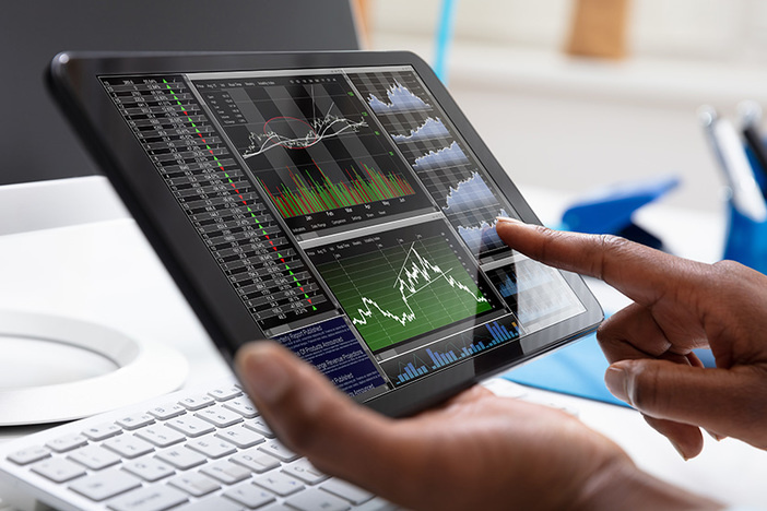 Worried About a Stock Market Crash? Prepare for the Bear Without Fear Close-up Of A Businessperson Pointing On Stock Chart Over The Tablet Screen