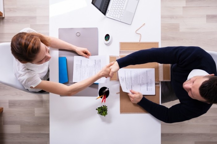 20 Questions to Ask a Prospective Property Manager closing-deal-wholesale