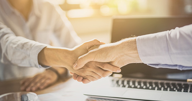 Finding Deals Every Other Investor Has Given Up On Business people shaking hands, finishing up meeting. Successful businessmen handshaking after good deal.