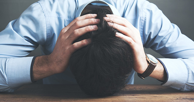 Due Diligence Gone Wrong: Lessons Learned from a Tragic Tale man in despair head on hand sitting in table