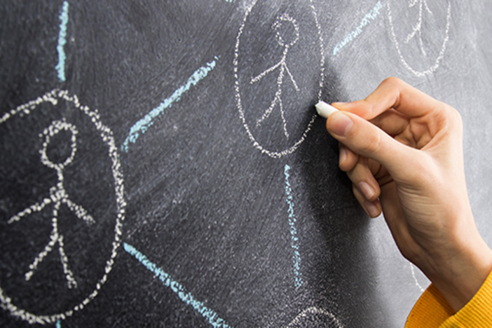 3 Impactful Ways to Use Social Media as a Real Estate Investor hand drawing on blackboard with chalk social or social media network scheme