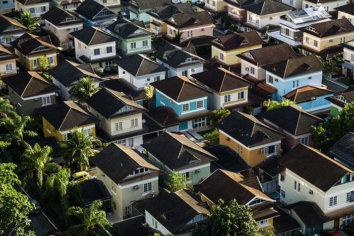 Interactive Map: U.S. Housing Markets at Highest Risk Post-Coronavirus aerial shot of neighborhood with two-story houses close together