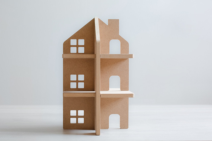 Real Estate Ride Along: 6-Unit Multifamily Rental Property Deal Analysis & Property Walkthrough wooden model of multifamily property on gray background