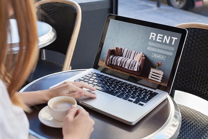 6 Tips for Listing Your Rental Property Online rent online concept, woman using internet website for rental apartments, houses and flats
