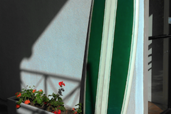 Real Estate Investing is Just like Surfing surfboard