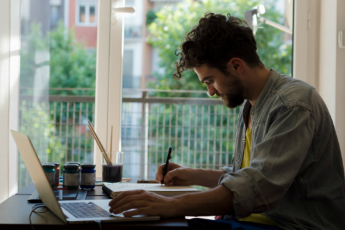How to Create More Time for Real Estate Deals While Working a 9-5 working-computer